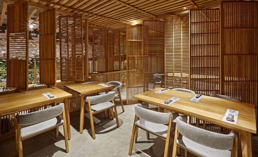 midcentury modern inspired furnishings throughout bring a western quality to the japanese style space